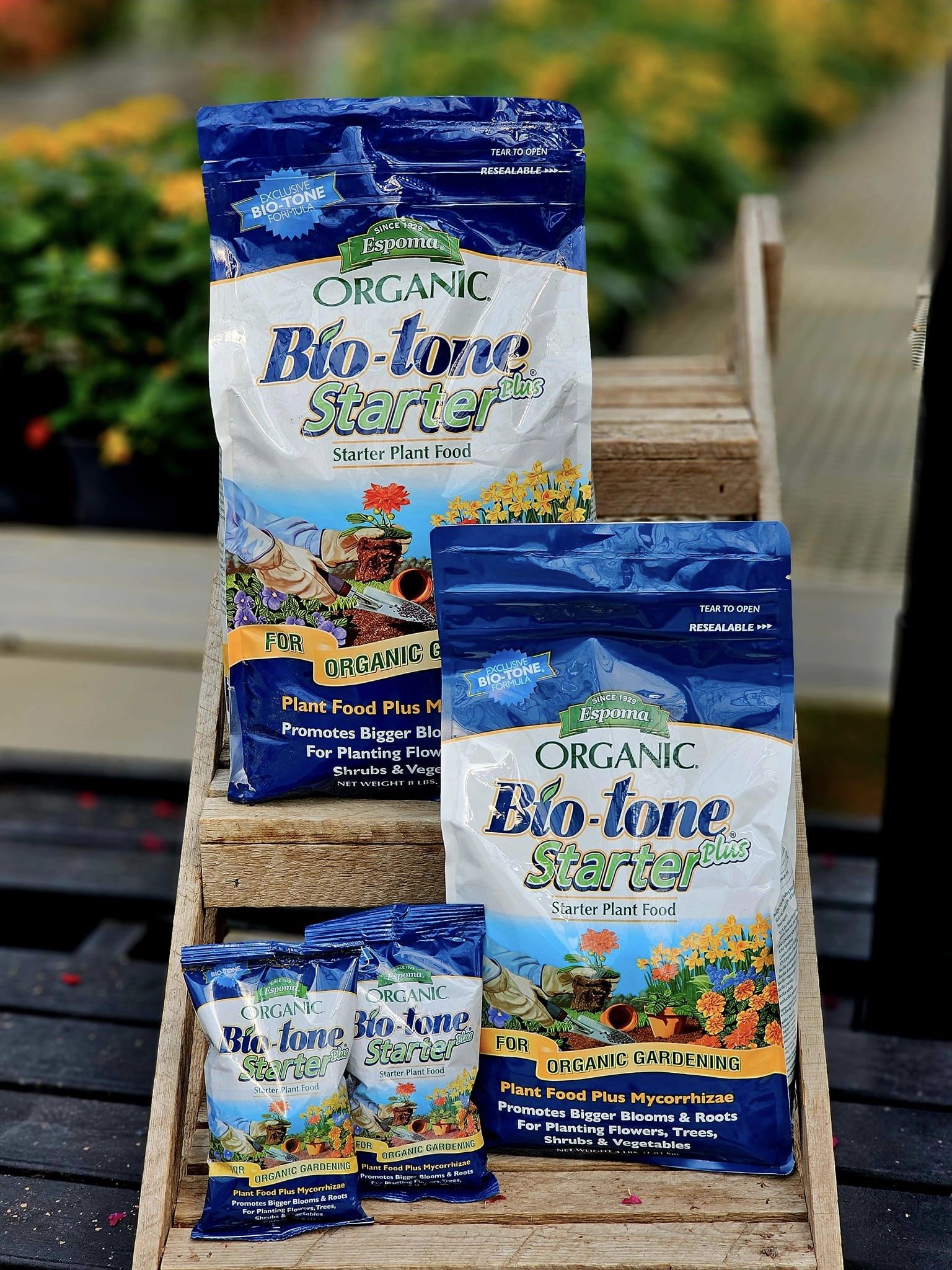 several different sizes of espoma bio tone fertilizer